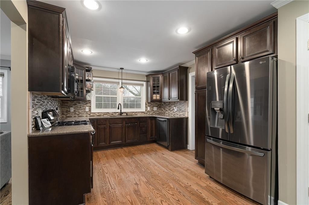 9501 Riggs Street — photo 22