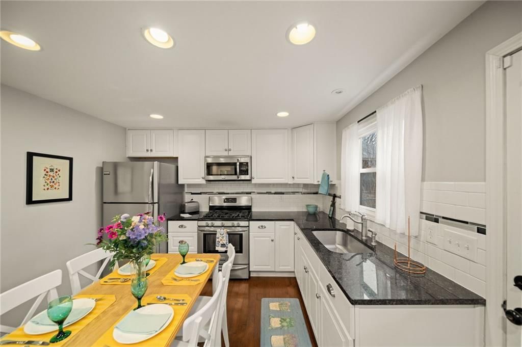 309 E 80th Terrace — photo 11