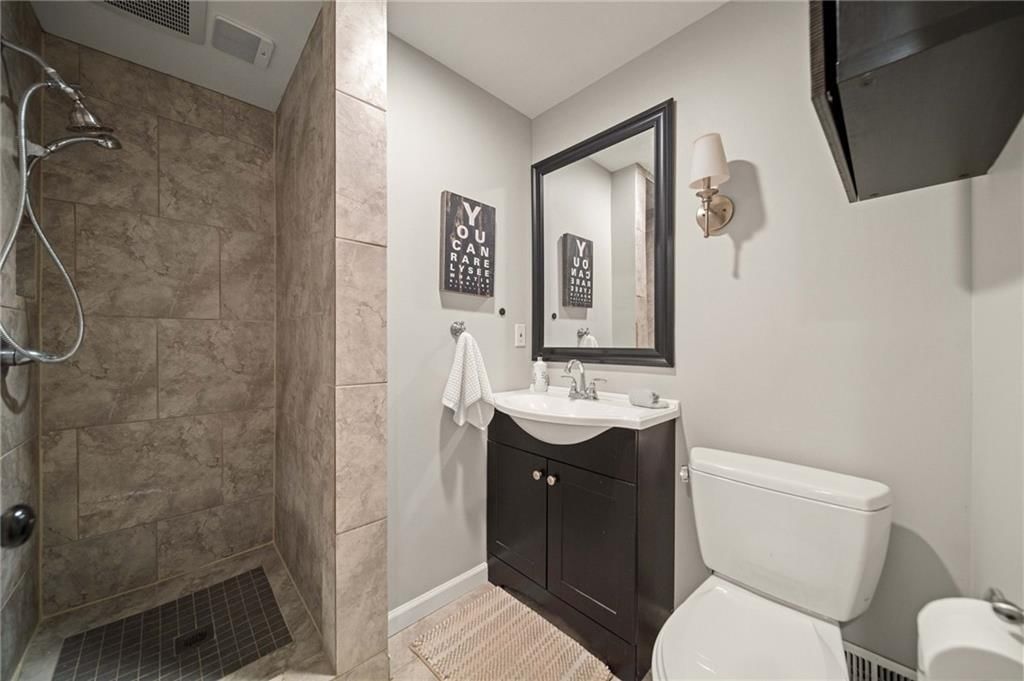 309 E 80th Terrace — photo 18