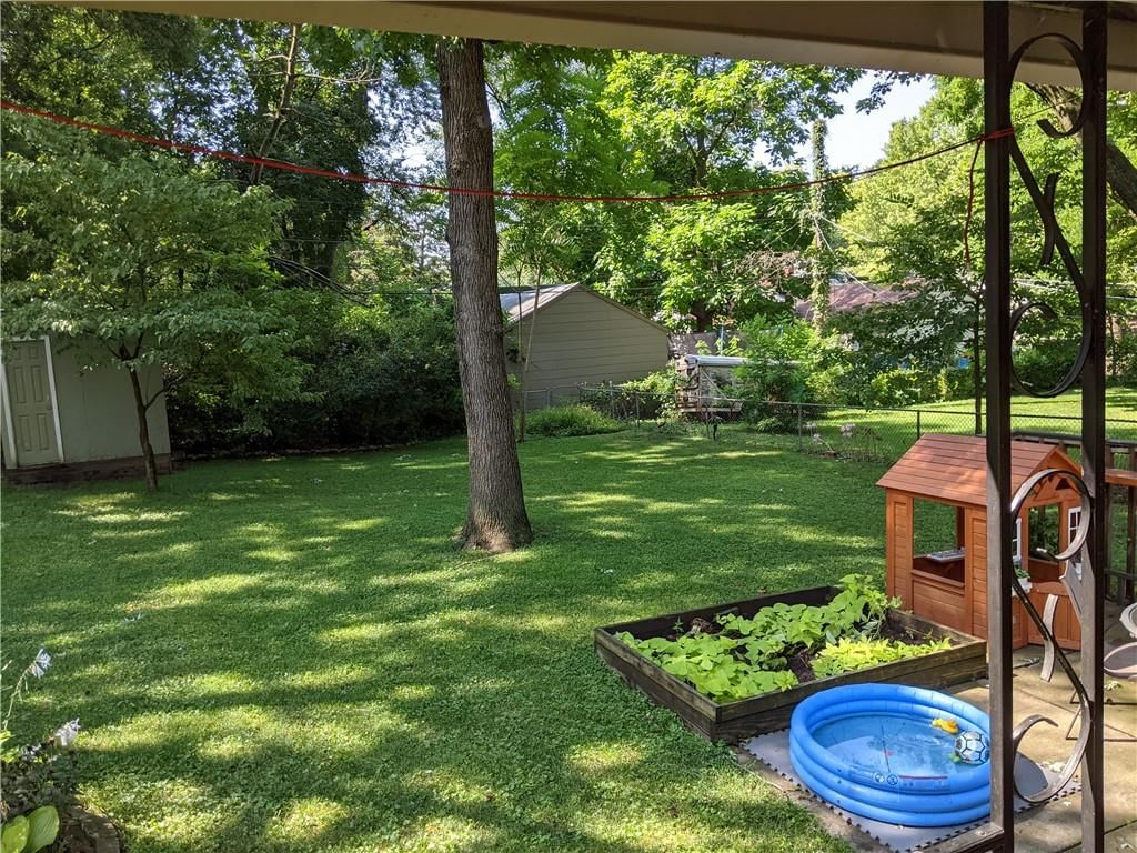 309 E 80th Terrace — photo 29