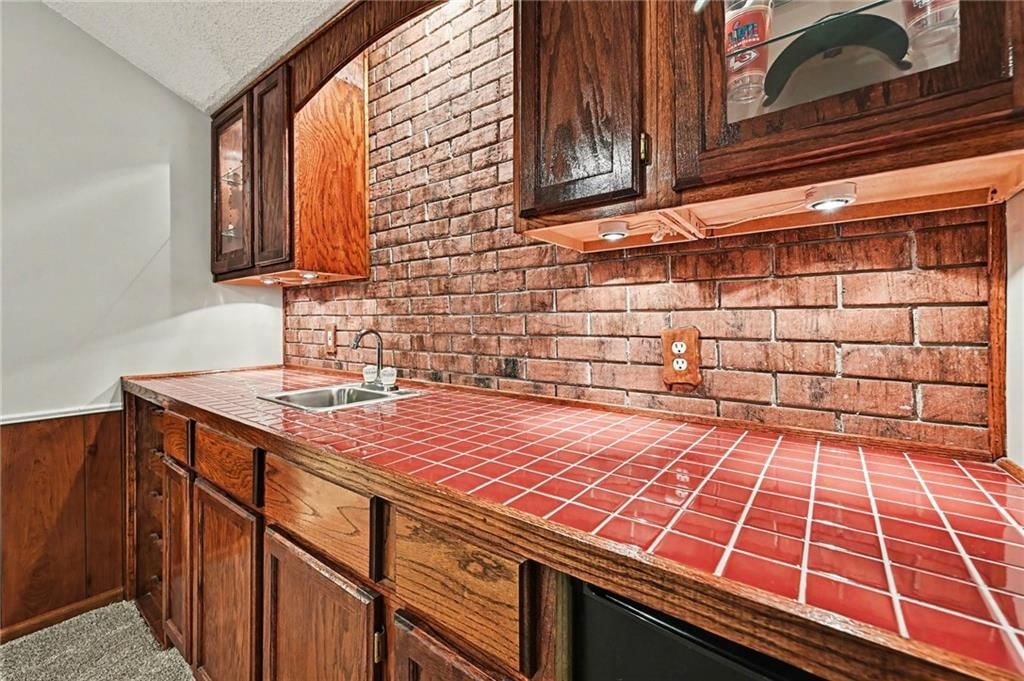 6735 NW Monticello Terrace — photo 30