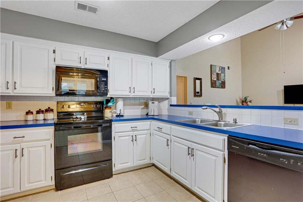 13825 W 58th Terrace — photo 7