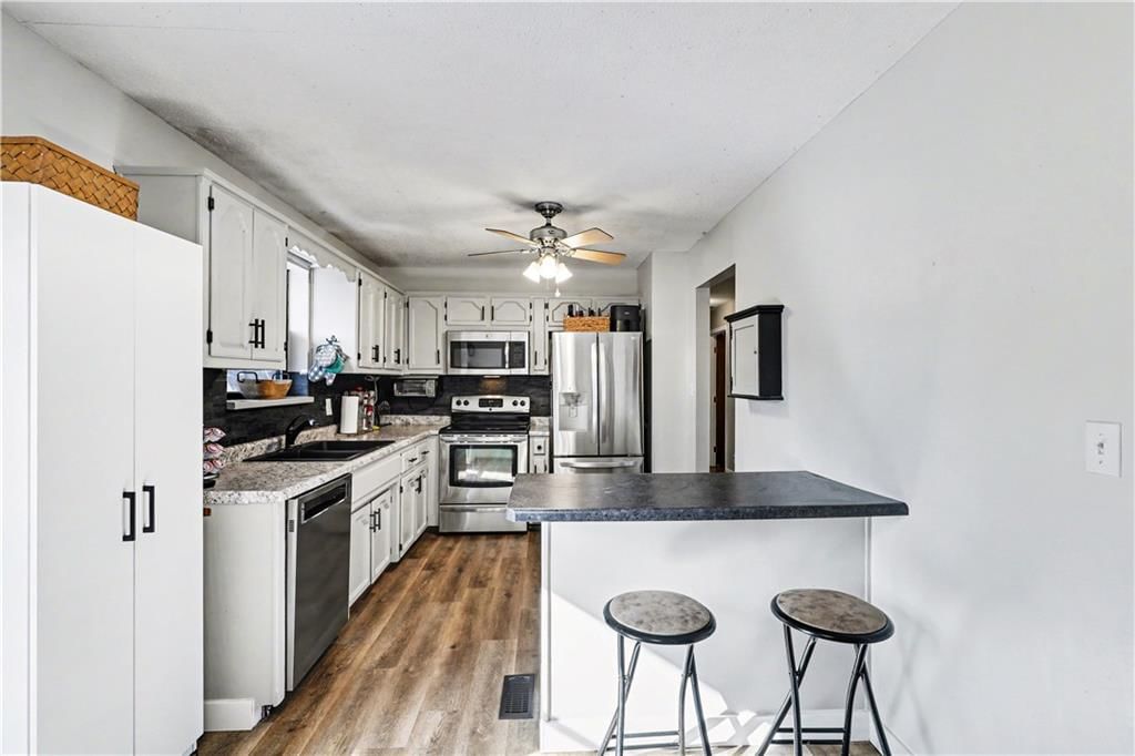 10425 N Baltimore Avenue — photo 12
