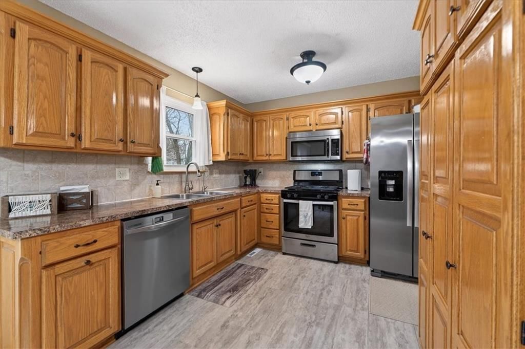 5209 NW Pennington Lane — photo 8