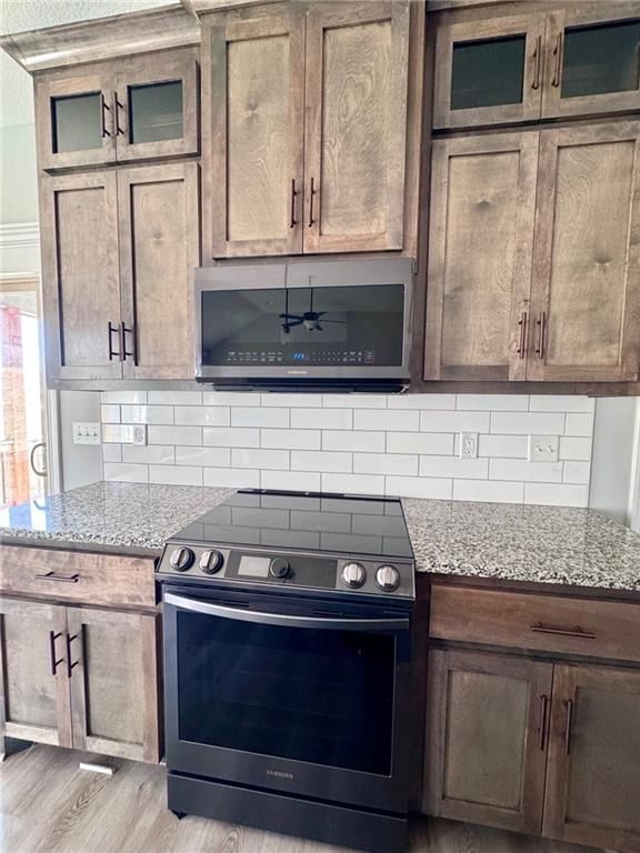 803 NW Hickory Ridge Drive — photo 6