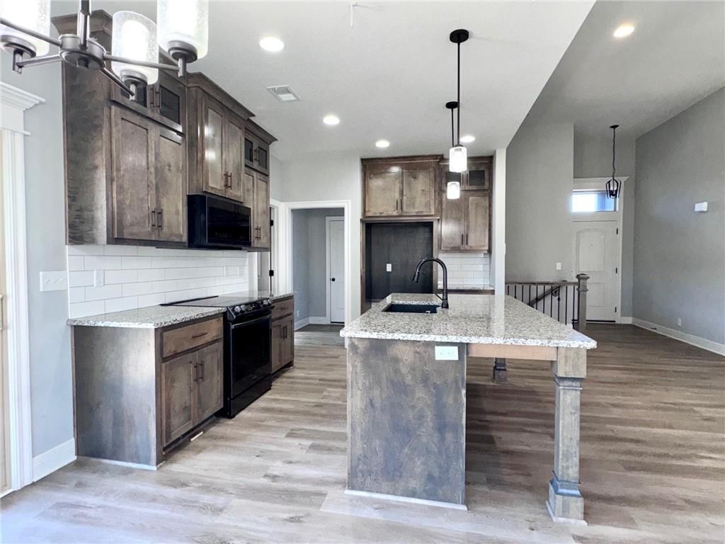 803 NW Hickory Ridge Drive — photo 7