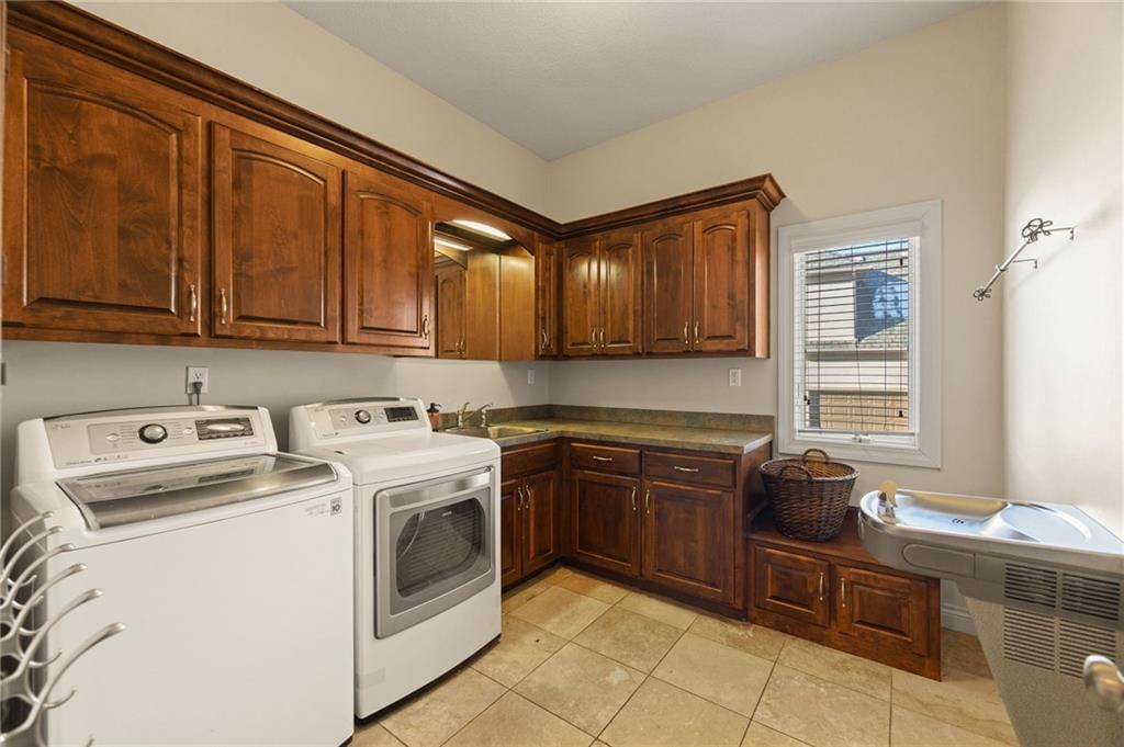 2421 NE Lake Breeze Drive — photo 35