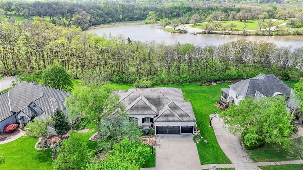 2421 NE Lake Breeze Drive — photo 79