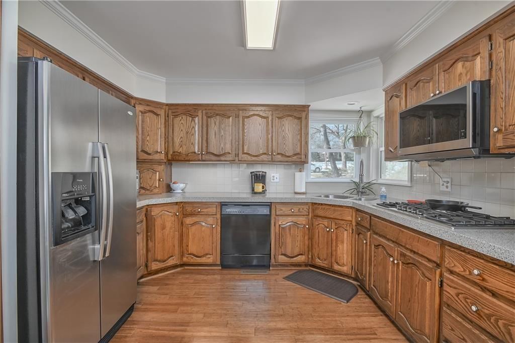 8219 NW Hillside Drive — photo 15
