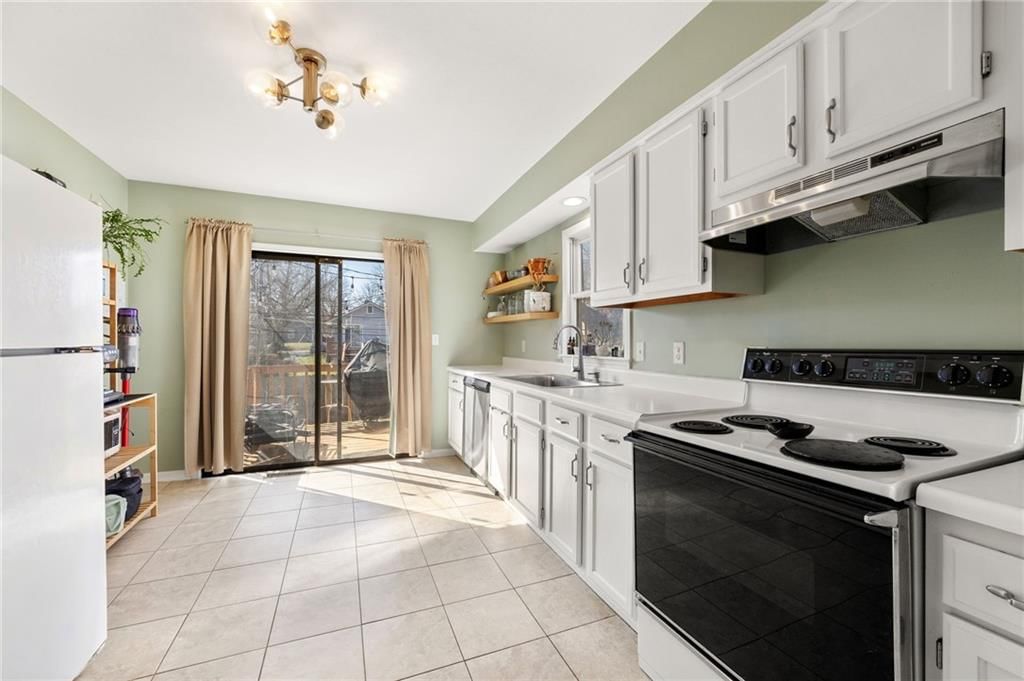 301 W 81st Terrace — photo 15
