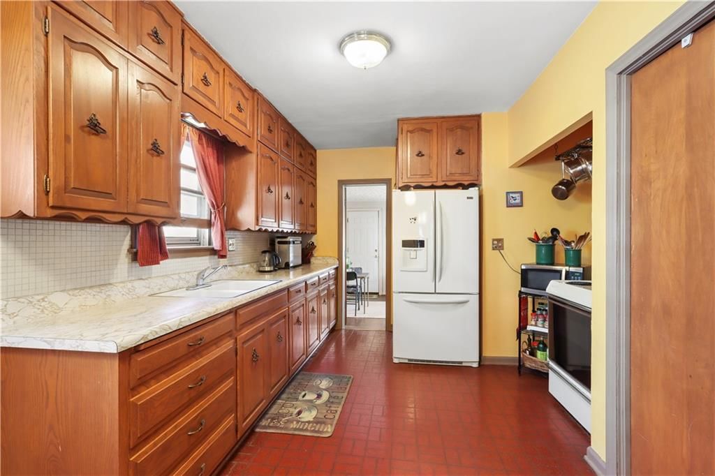 6115 Holmes Street — photo 8