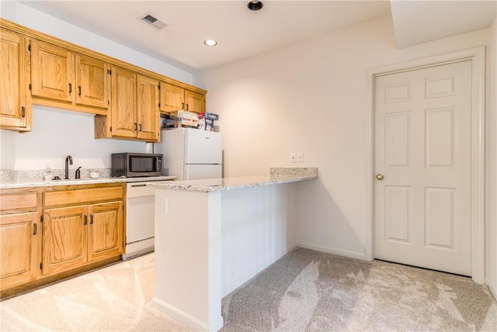 717 NE SILVERLEAF Place — photo 38