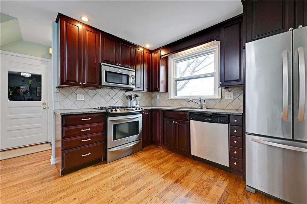 408 E 73rd Terrace — photo 13