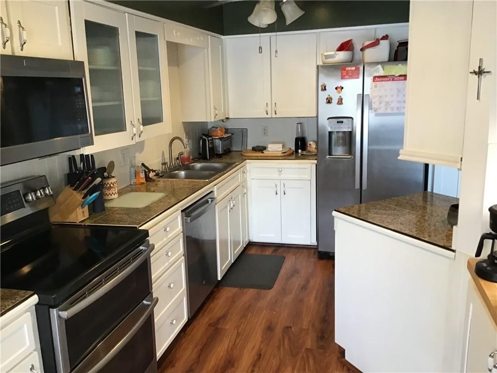 8395 NW WAUKOMIS Drive — photo 7