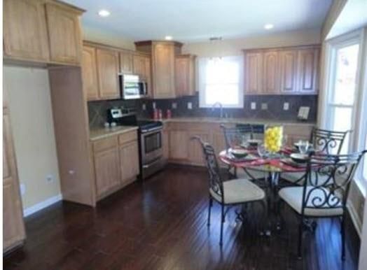 10716 BELLAIRE Avenue — photo 3