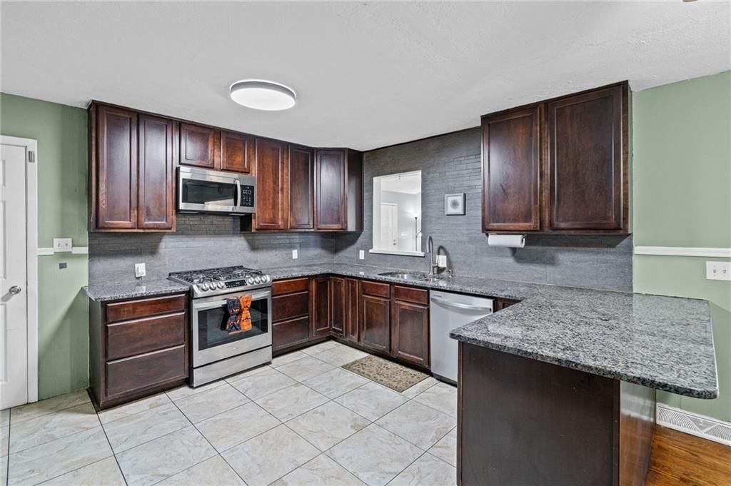 7321 Sloan Avenue — photo 10