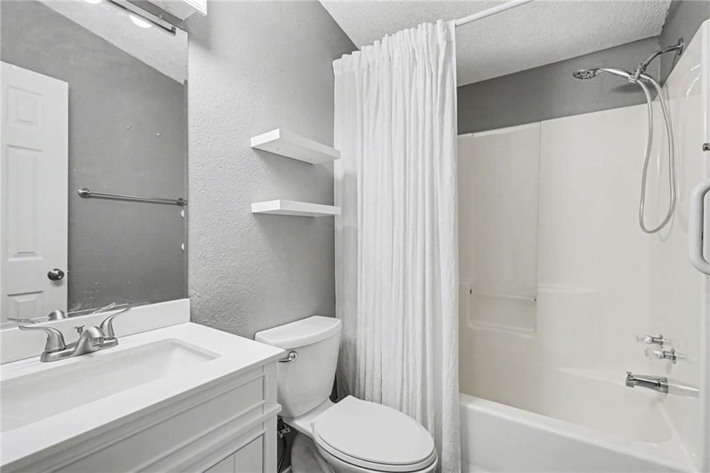 1002 NE White Oaks Lane — photo 13