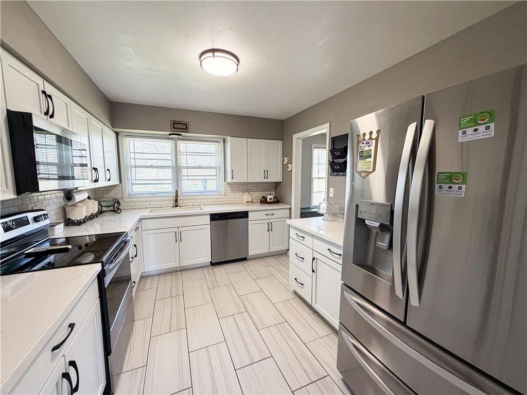4980 NE Chouteau Drive — photo 18