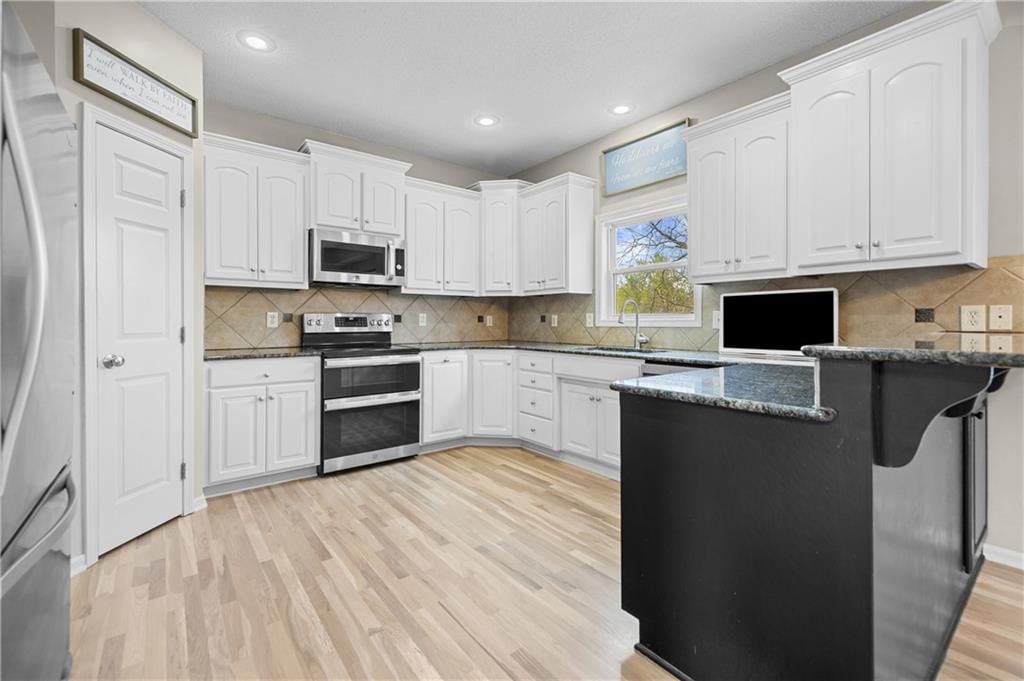12122 W 73 Terrace — photo 13