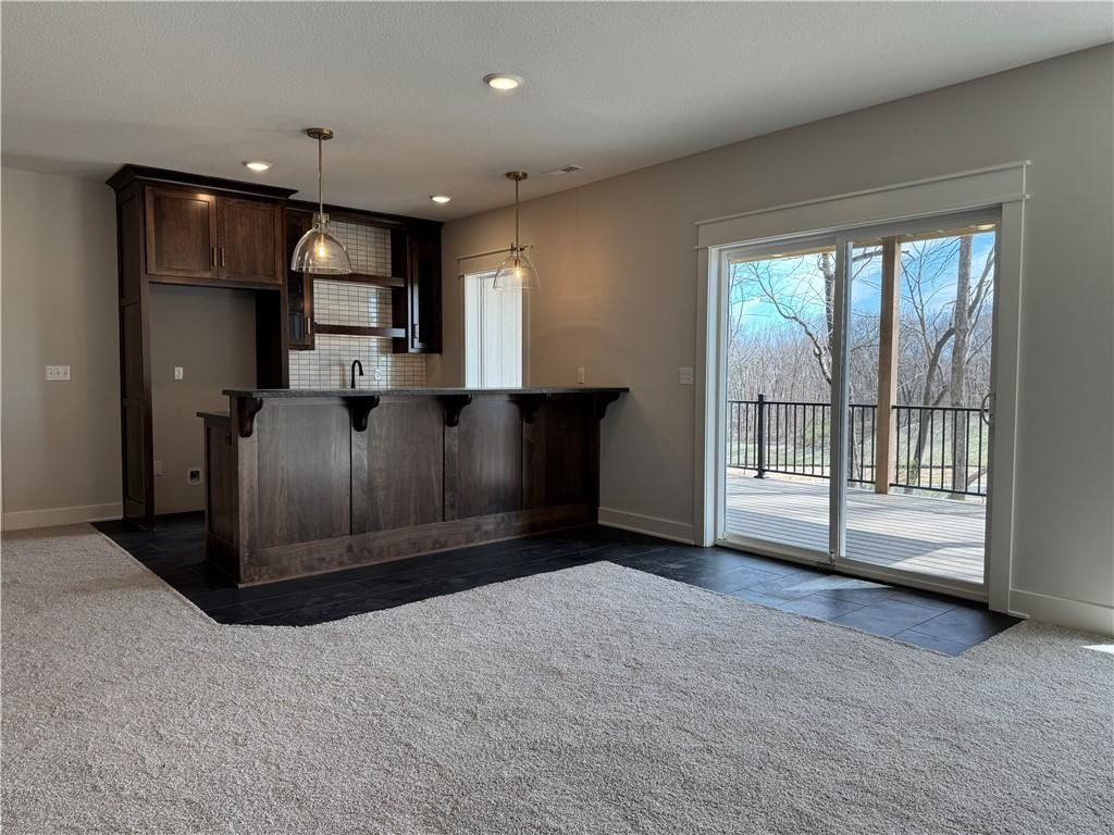 4800 NW Huonker Court — photo 28
