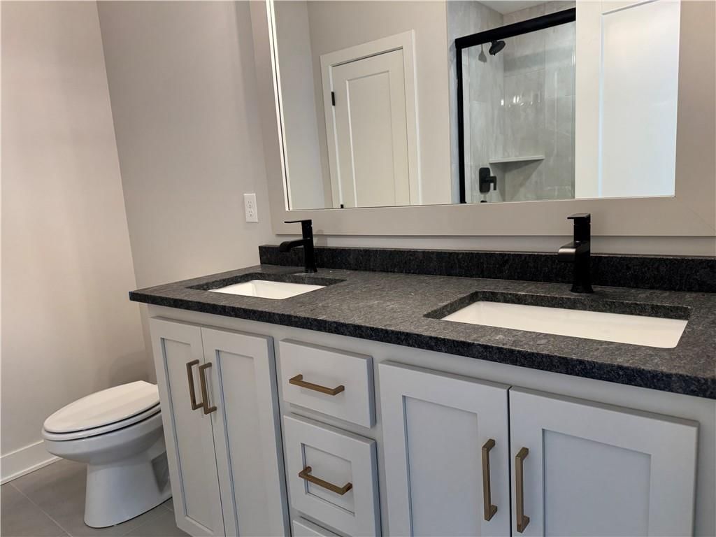 4800 NW Huonker Court — photo 31