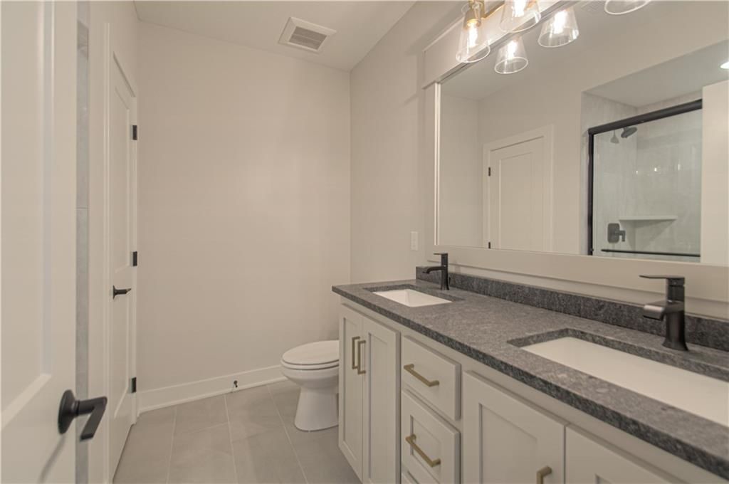 4800 NW Huonker Court — photo 41