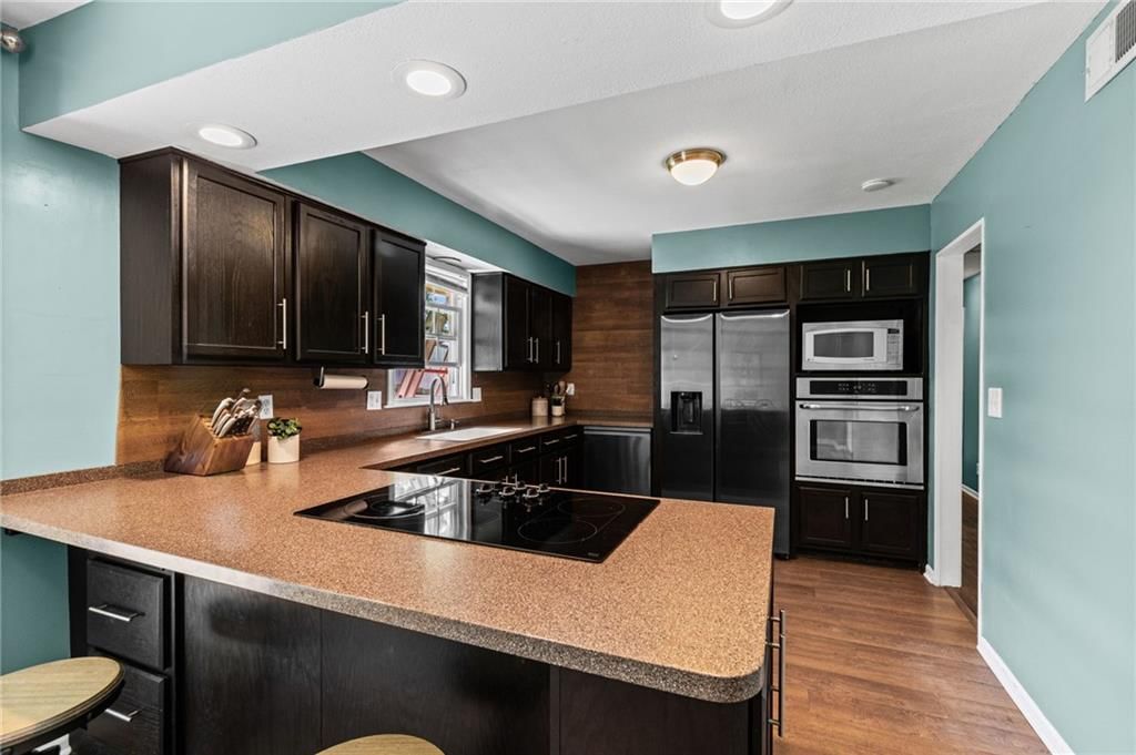 6817 NW Pleasant View Drive — photo 4
