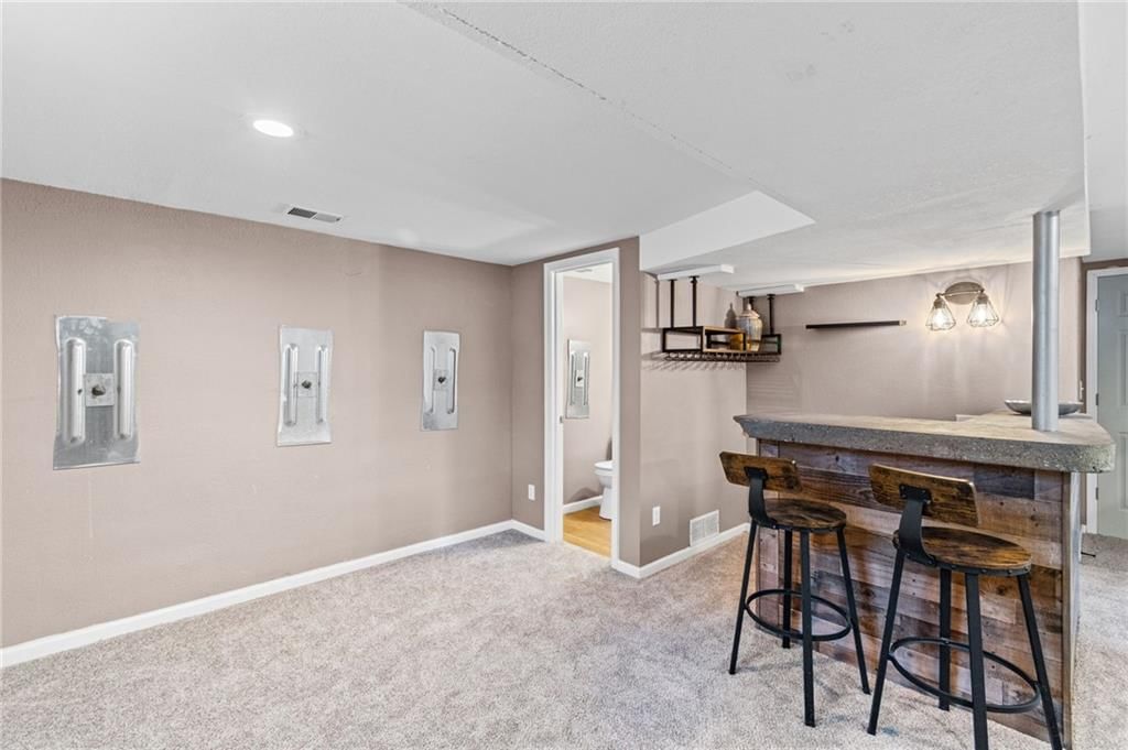 6817 NW Pleasant View Drive — photo 13