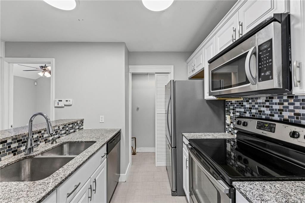 11903 W 58th   Unit H Place — photo 10