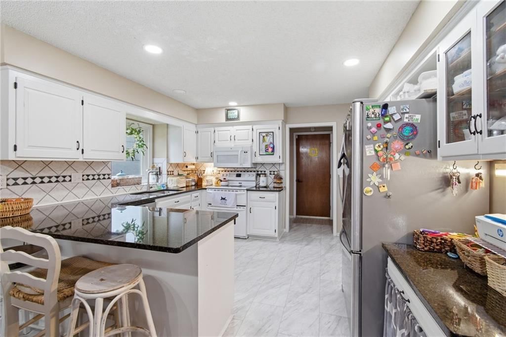4121 NW Delwood Drive — photo 12