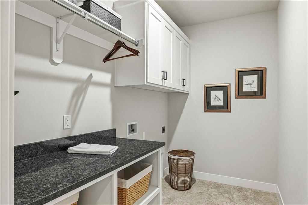 Photo 22 of 47 - 510 Bentwater Drive, Raymore, MO 64083
