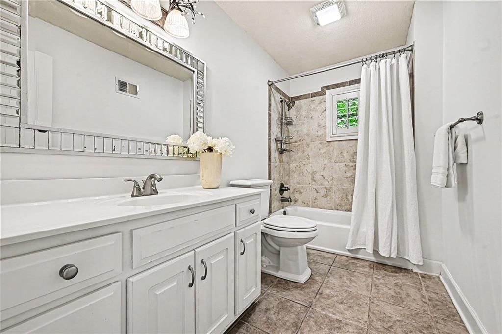 6134 Howe Drive — photo 27