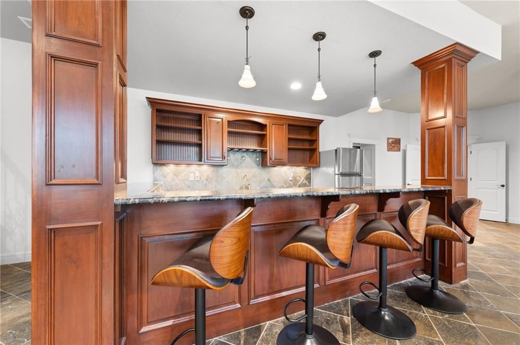 6930 NW WHITE PINE Circle — photo 49