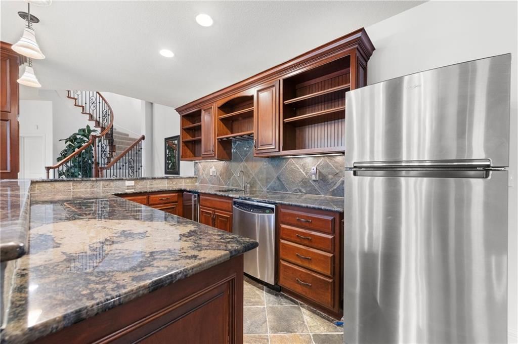6930 NW WHITE PINE Circle — photo 50