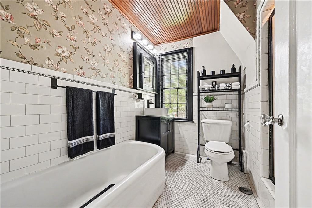 419 W 70th Terrace — photo 19