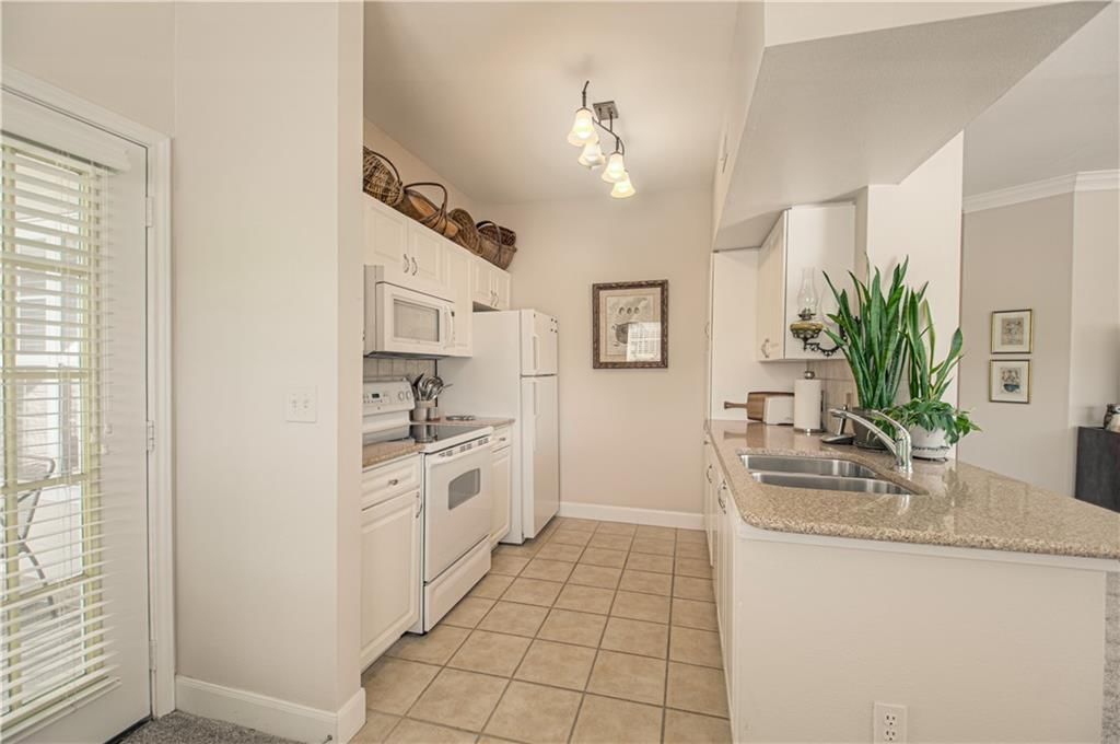 11630 Tomahawk Creek Parkway — photo 4