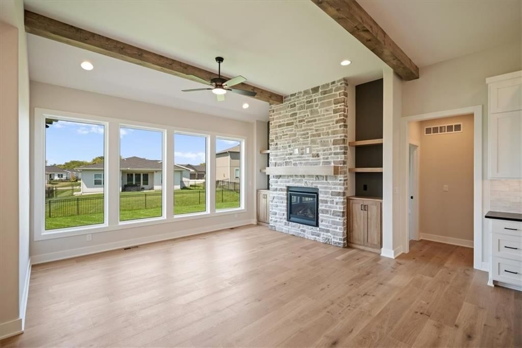 Fireplace, exposed brick wall and brick fireplace at 2622 SW Barley Field Drive, Lee's Summit, MO 64082
