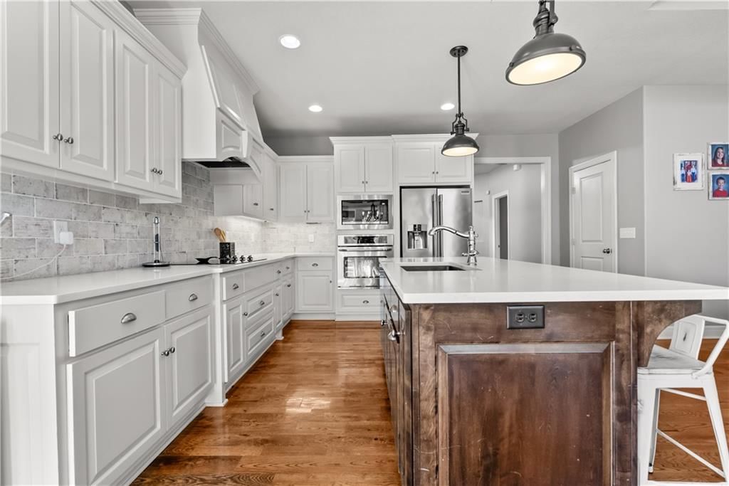 1308 NE Woods Edge Circle — photo 16