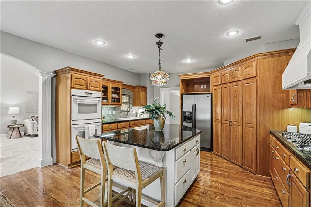 9708 Walnut Woods Drive — photo 11