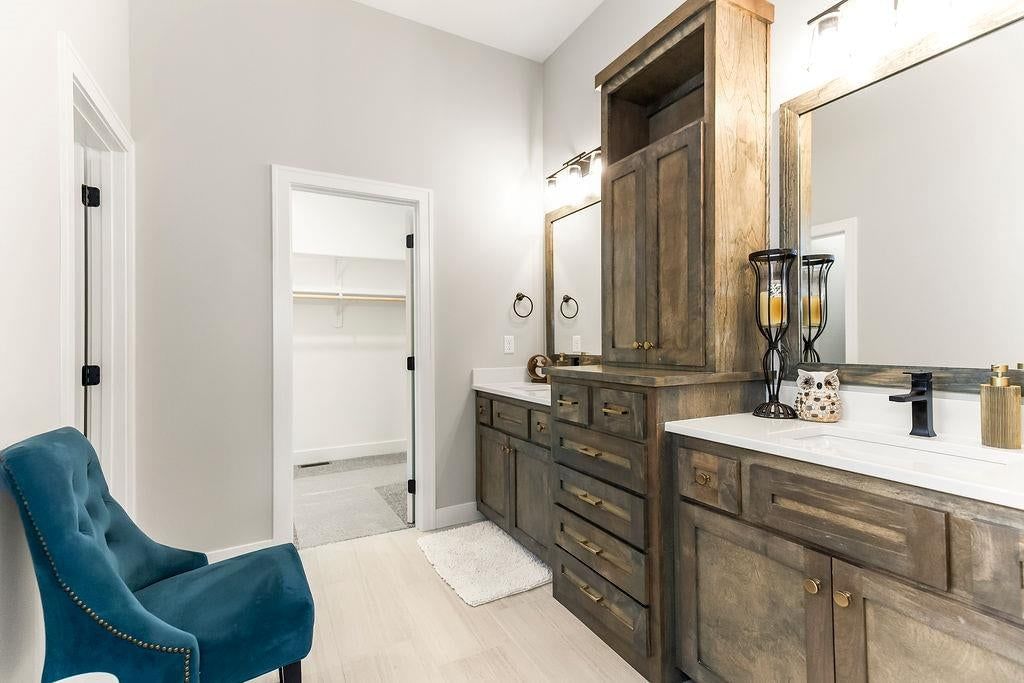 Walk-in shower, tiled shower and frameless glass shower at 27602 E 128th Court, Lake Lotawana, MO 64086