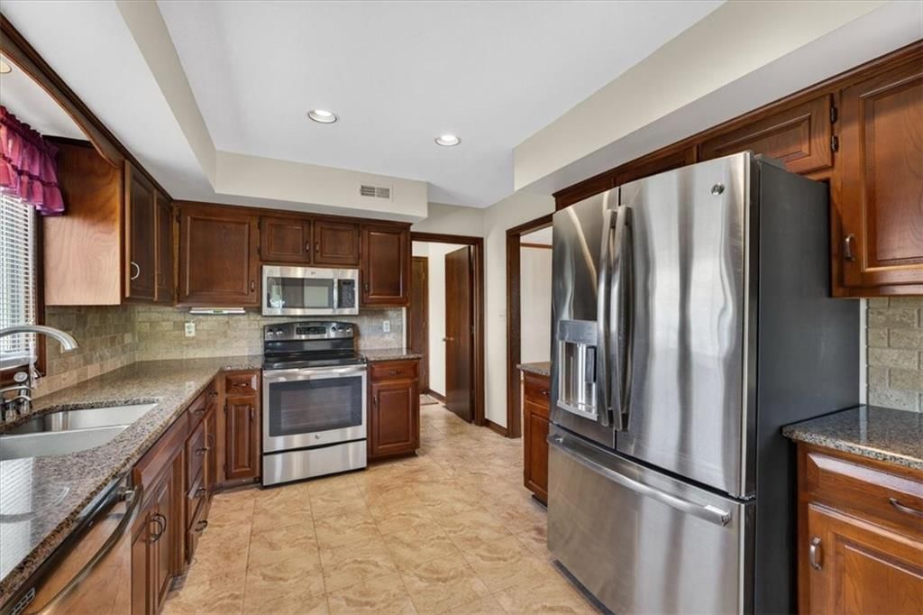 4933 SW Raintree Parkway — photo 10