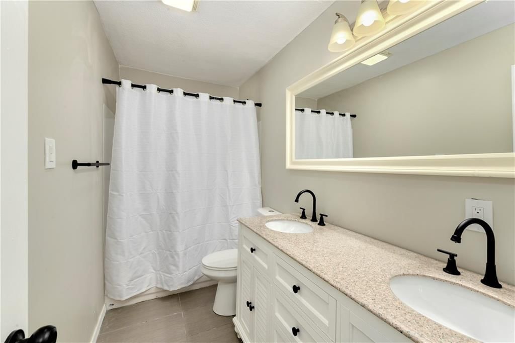 8746 N Troost Avenue — photo 12