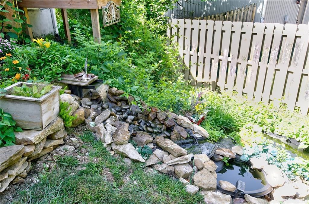 5716 NW Creekview Drive — photo 36