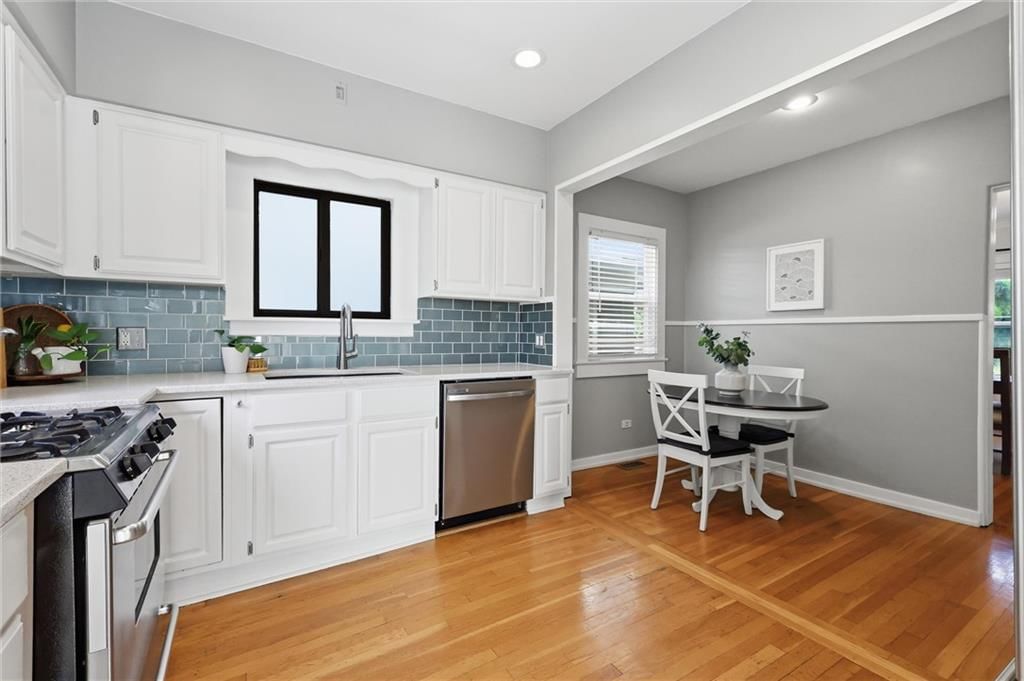 203 W 66th Terrace — photo 11
