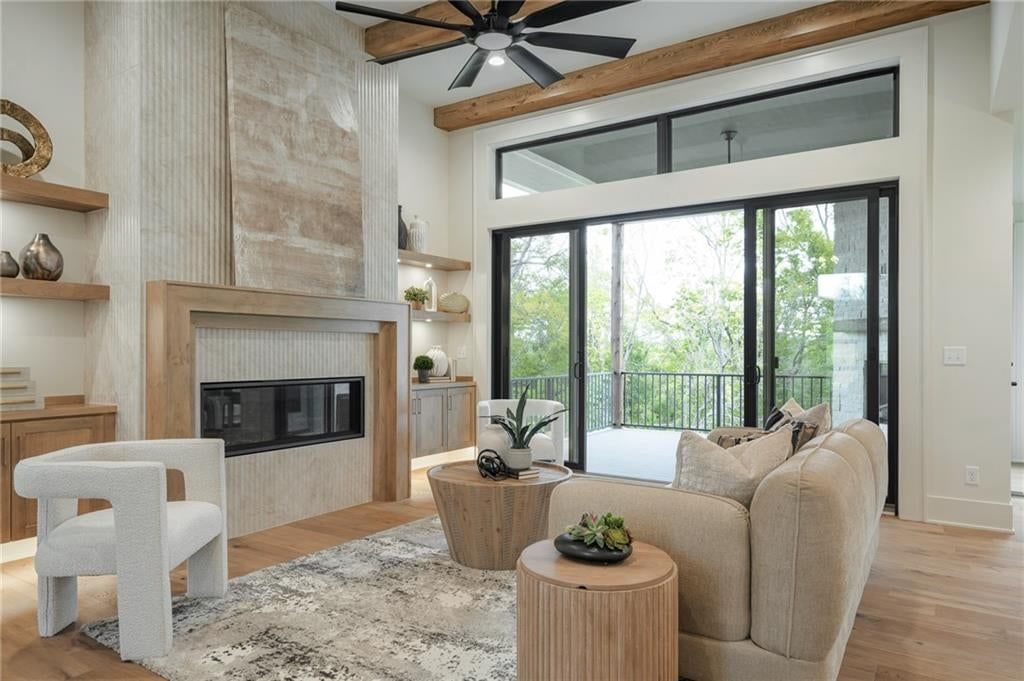 Floor-to-ceiling windows, black window frames and wall of windows at 514 Turnbridge Drive, Raymore, MO 64083