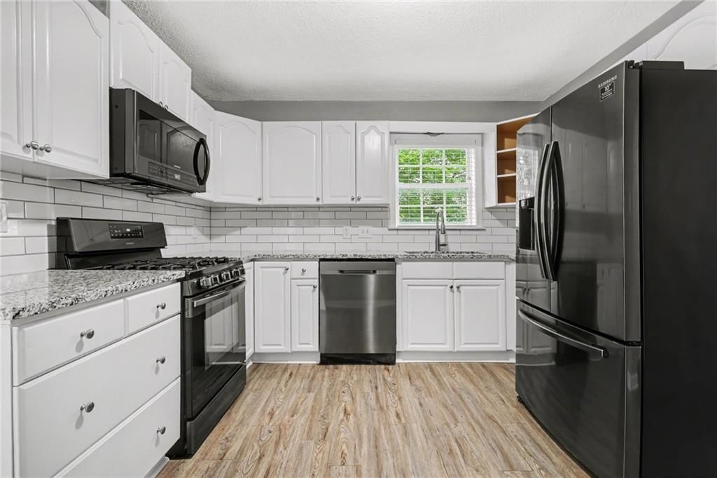 645 NE Barry Road — photo 8