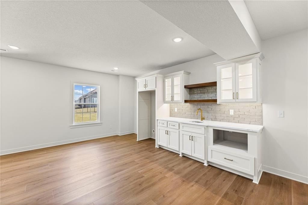 Finished basement and wet bar at 4467 Tee Box Drive, Basehor, KS 66007