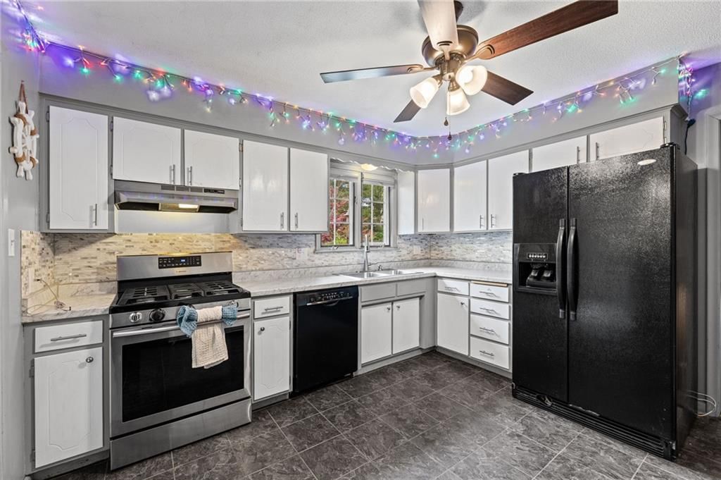 7617 NW Milrey Drive — photo 9