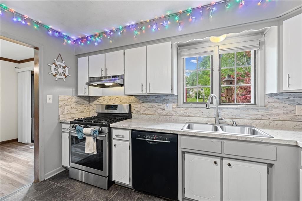 7617 NW Milrey Drive — photo 11