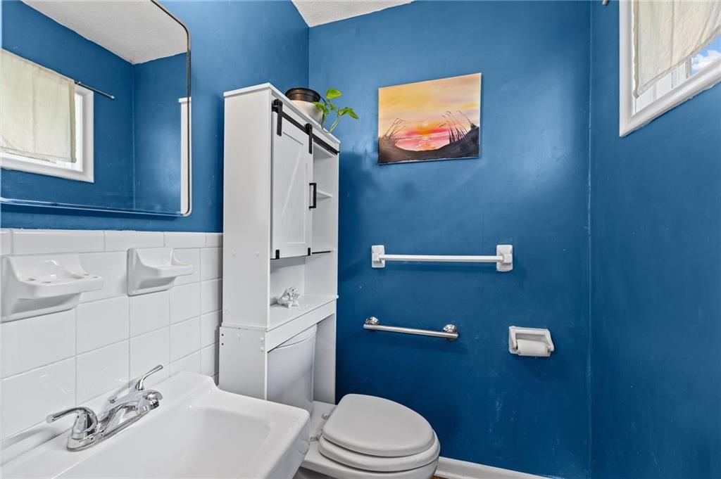 7617 NW Milrey Drive — photo 16